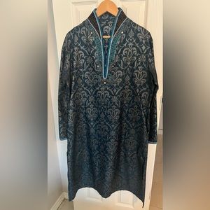 This beautiful Kurta is a one of a kind. Beautiful embroidery along collar.